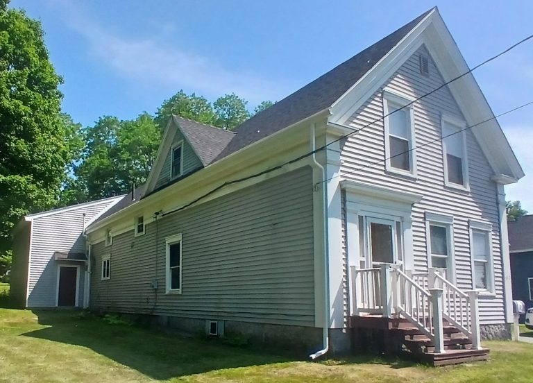rain gutter blends in well on this classic home