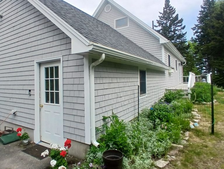 seamless gutters will protect the deck and flower garden