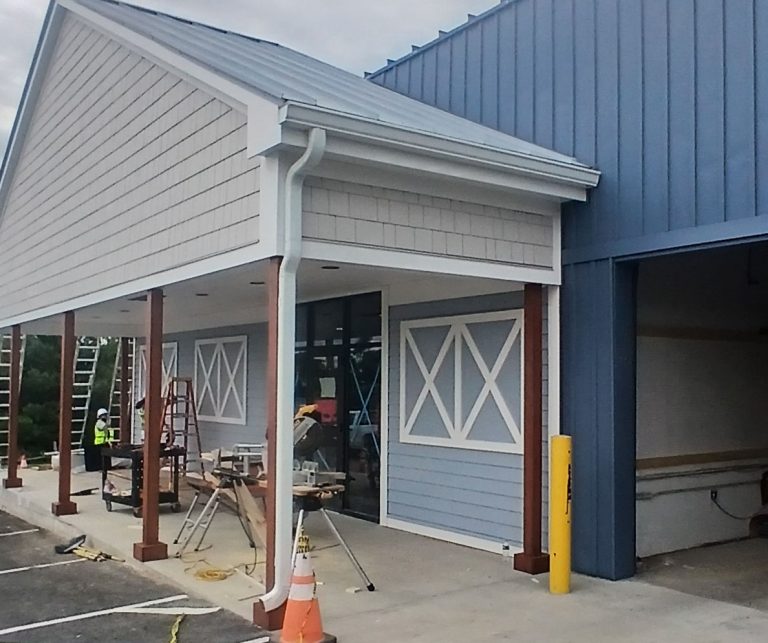 rain gutter to protect entrance to retail store