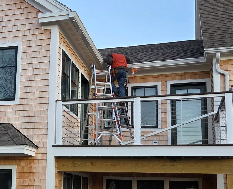 rain gutters will protect the wood deck and siding