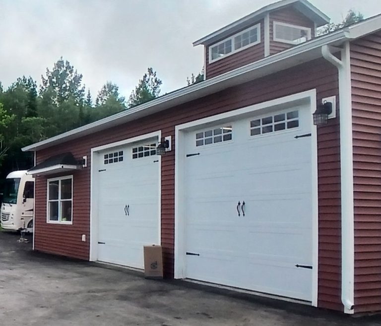 seamless gutters provide protection and enhance the appearance of this garage