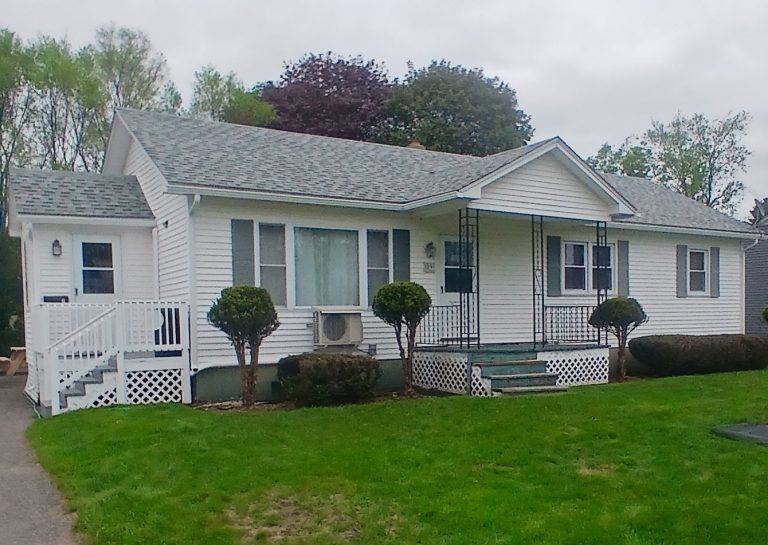 white rain gutters match the house trim